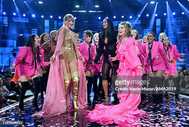 Taylor Swift, Ciara, and Shania Twain perform onstage during the 2019 American Music Awards at Microsoft Theater on November 24, 2019 in Los Angeles,...