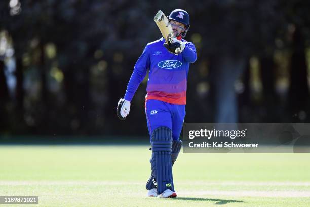 Colin Munro of Auckland celebrates his century during the Ford Trophy match between Wellington Firebirds and Auckland Aces on November 25, 2019 in...