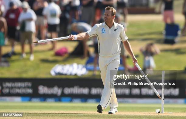 Neil Wagner of New Zealand with two stumps after his team won the first Test match between New Zealand and England at Bay Oval on November 25, 2019...