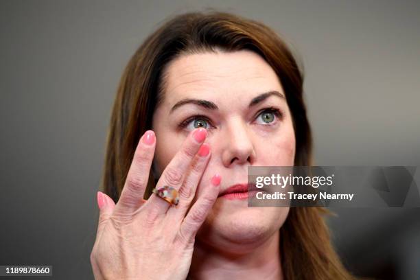 Senator Sarah Hanson-Young reacts during a press conference after winning her defamation case against against former Senator David Leyonhjelm today...