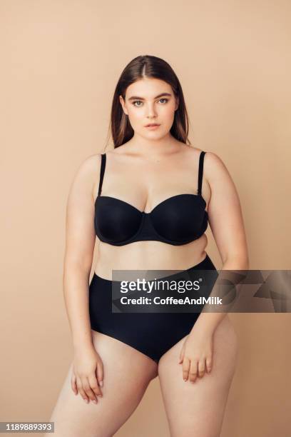 chubby young woman. plus size woman - plus size fashion model stock pictures, royalty-free photos & images