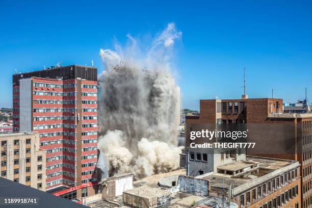 bank of lisbon building being demolished in johannesburg - demolish stock pictures, royalty-free photos & images