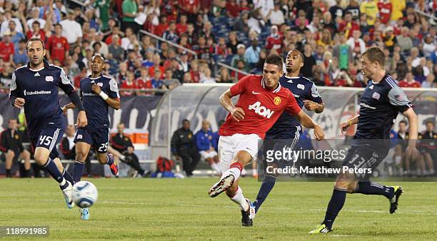 Federico Macheda of Manchester United scores their third goal during the pre-season friendly match between New England Revolution and Manchester...