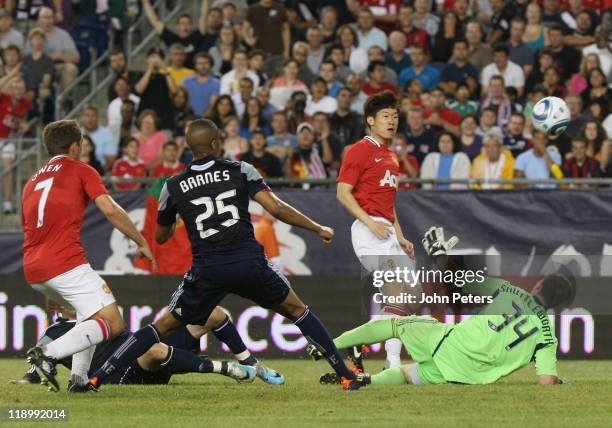Ji-Sung Park of Manchester United scores their fourth goal during the pre-season friendly match between New England Revolution and Manchester United...