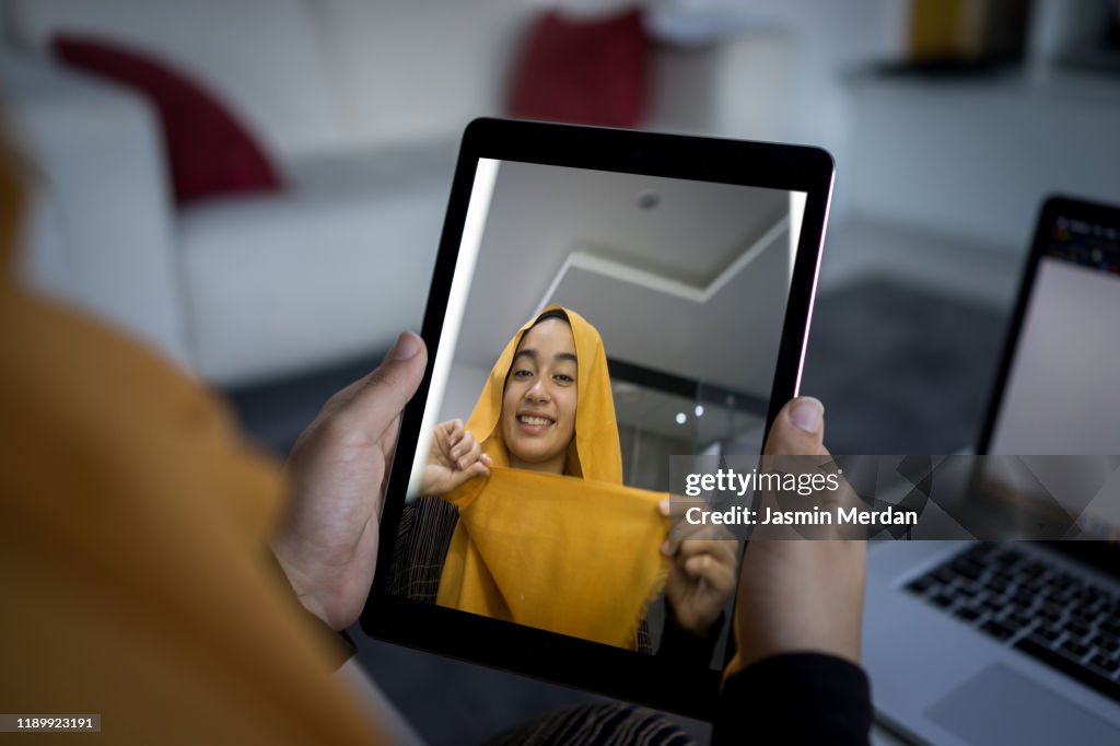 Learning from Muslim vlogger how to put Hijab on