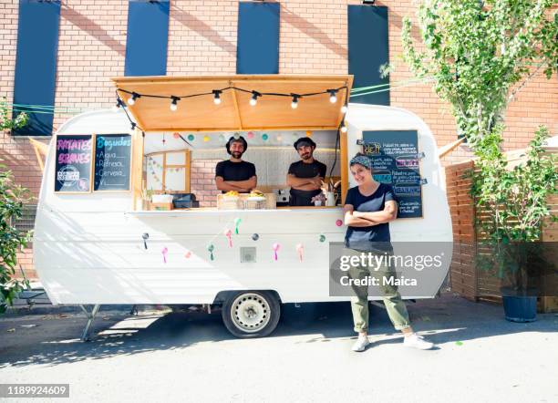 happy entrepreneurs in the food truck - street food van stock pictures, royalty-free photos & images