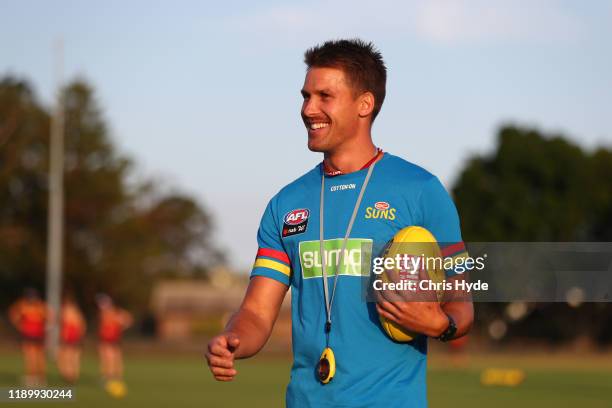 Skills coach Andrew Swallow looks on during a Gold Coast Suns AFLW training session at Austworld Centre at Metricon Stadium on November 25, 2019 in...