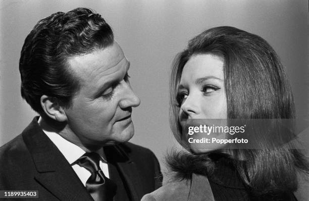 British actors Patrick Macnee and Diana Rigg, who play the roles of John Steed and Emma Peel in the ABC Television series The Avengers, posed...