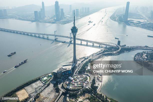 macau tower convention and city skyline - pearl river delta stock pictures, royalty-free photos & images