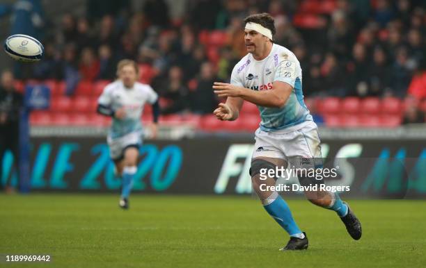 Jono Ross of Sale Sharks passes the ball during the Heineken Champions Cup Round 2 match between Sale Sharks and La Rochelle at AJ Bell Stadium on...