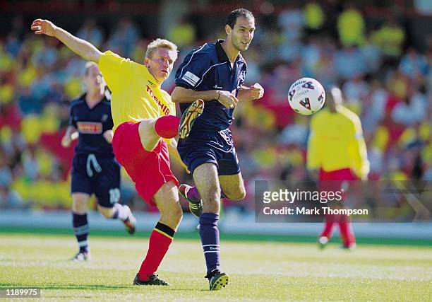Pedro Matias of Walsall and Allan Neilson of Watfrod challenge for the ball during the Nationwide Division One match between Watford and Walsall...