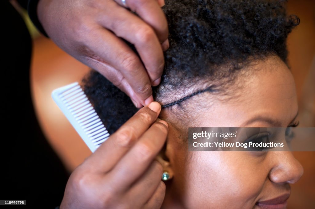 Woman Getting Hair Styled at Salon