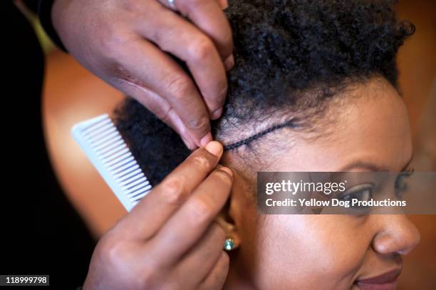 woman getting hair styled at salon - braid hairstyle stock pictures, royalty-free photos & images