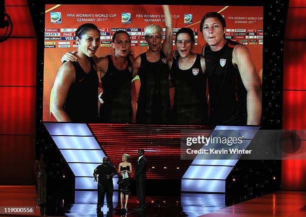 Soccer Players Carli Lloyd, Christie Rampone, Megan Rapinoe, Ali Kreiger,and Abby Wambach appear via video as singer Cee-Lo, actress Amber Heard and...