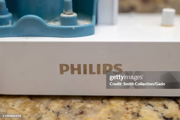 Close-up of logo for electronics conglomerate Philips on Sonicare tooth brush base, August 21, 2019.