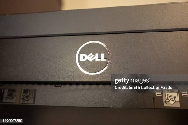 Close-up of logo for Dell computers on a computer peripheral in an office, August 21, 2019.