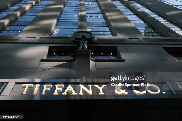 The Tiffany & Co sign is displayed outside of their flagship store along Fifth Avenue in Manhattan on November 25, 2019 in New York City. LVMH, the...