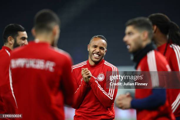 Youssef El Arabi of Olympiacos reacts during a training session ahead of their UEFA Champions League Group B match against Tottenham Hotspur at...