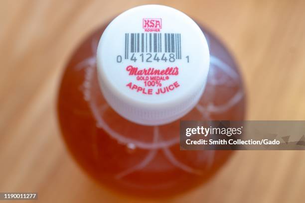 Close-up of logo for KSA Kosher certification on top of Martinelli's apple juice bottle, September 2, 2019.