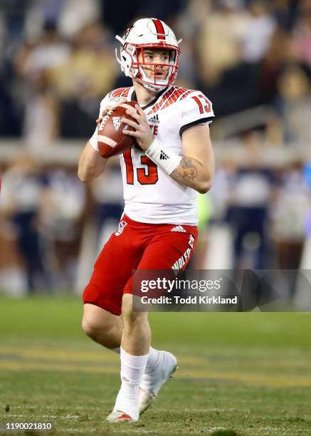 Devin Leary of the North Carolina State Wolfpack drops back to pass during the second half against the Georgia Tech Yellow Jackets at Bobby Dodd...