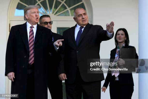 President Donald Trump and Bulgarian Prime Minister Boyko Borissov pause to pose for photographs on the Rose Garden colonnade at the White House...