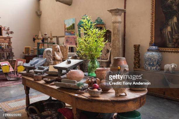 interior view of antique store in mexico - antique shop stock-fotos und bilder