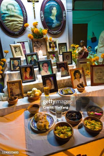 an ofrenda altar shrine on day of the dead in merida, yucatan, mexico - religious offering stock pictures, royalty-free photos & images