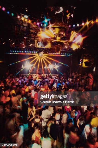 View over of the crowded dancefloor at the Xenon nightclub, New York, New York, 1978.