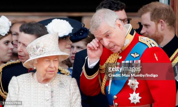 Queen Elizabeth II and Prince Andrew, Duke of York watch a flypast from the balcony of Buckingham Palace during Trooping The Colour, the Queen's...