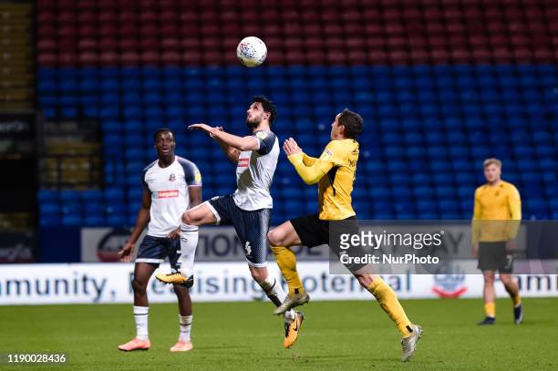 Bolton Wanderers midfielder Jason Lowe and Southend United midfielder Mark Milligan during the Sky Bet League 1 match between Bolton Wanderers and...