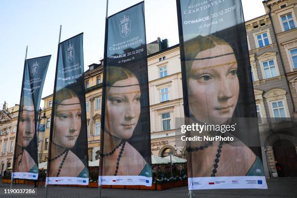 Leonardo da Vinci's 'Lady with an Ermine' painting is printed on flags advertising the reopening of the Czartoryski Princes Museum in Krakow, Poland,...