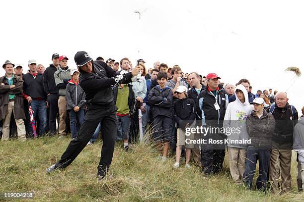 Rickie Fowler of the United States hits his 2nd shot on the 4th hole during the first round of The 140th Open Championship at Royal St George's on...