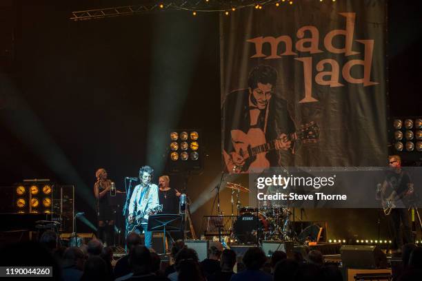 Ronnie Wood performs on stage at Symphony Hall on November 25, 2019 in Birmingham, England.