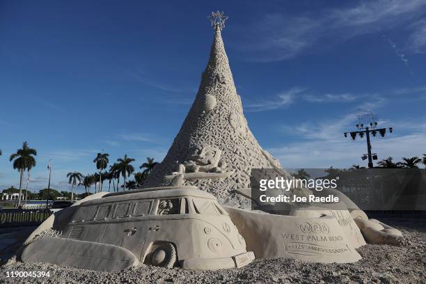 Sandi,” the world’s only 700-ton sand tree is seen as sculptors from Sandtastic near the completion of the holiday sand tree on November 25, 2019 in...