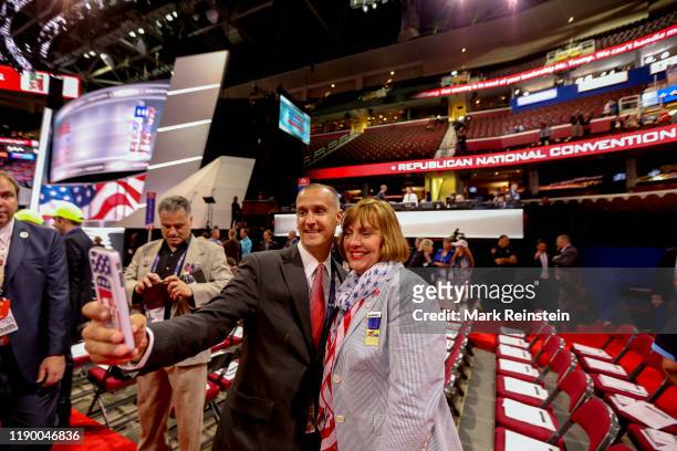 Cleveland, Ohio, USA, July 18, 2016 Corey Lewandowski Donald Trump's former campaign manager takes a selfie with a delegate on the floor of the...