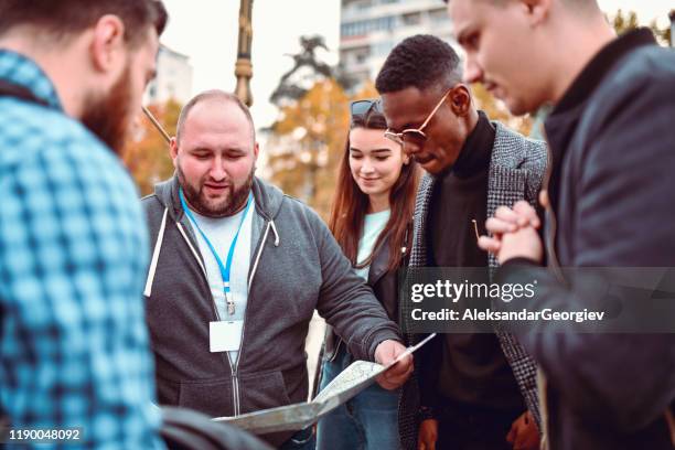 Tour Guide Explaining Tour Guide Flag Photos and Premium High Res Pictures - Getty Images