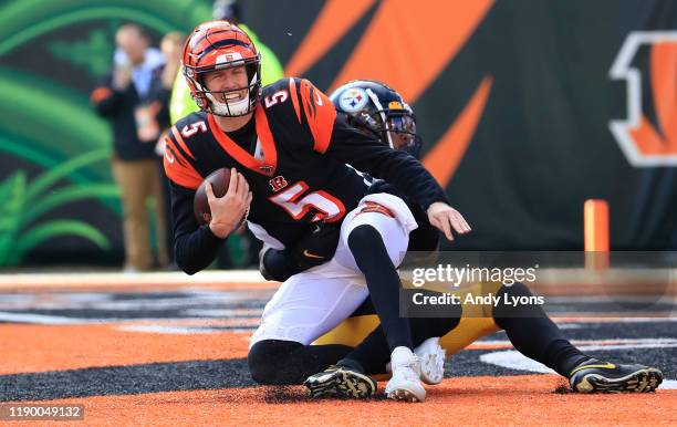 Ryan Finley of the Cincinnati Bengals is sacked by Mark Barron of the Pittsburgh Steelers during the game at Paul Brown Stadium on November 24, 2019...