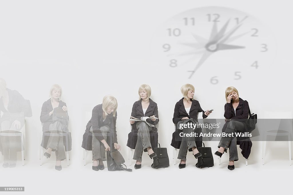 Iqueue Chair. Time Seated Woman Passing Time In A Waiting Room Queue High-Res Stock Photo ...