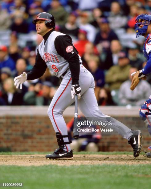 Dante Bichette of the Cincinnati Reds bats during an MLB game versus the Chicago Cubs at Wrigley Field in Chicago, Illinois during the 2000 season.