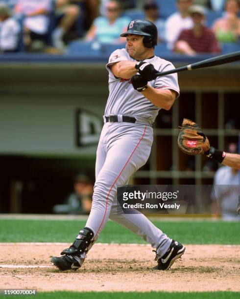 Dante Bichette of the Boston Red Sox bats during an MLB game at Comiskey Park in Chicago, Illinois.
