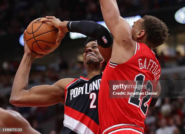 Hassan Whiteside of the Portland Trail Blazers tries to get off a shot against Daniel Gafford of the Chicago Bulls at United Center on November 25,...