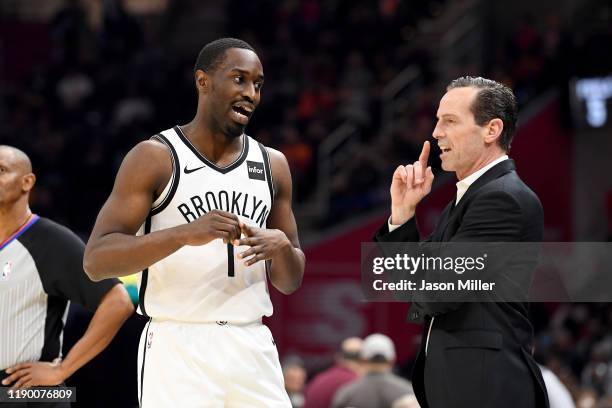 Theo Pinson of the Brooklyn Nets talks with head coach Kenny Atkinson during the second half against the Cleveland Cavaliers at Rocket Mortgage...