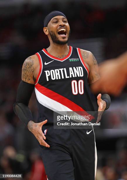Carmelo Anthony of the Portland Trail Blazers yells after a dunk against the Chicago Bulls at the United Center on November 25, 2019 in Chicago,...