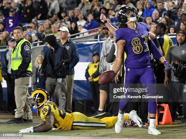 Wide receiver Willie Snead of the Baltimore Ravens celebrates a touchdown in the fourth quarter over the defense of defensive back Marqui Christian...