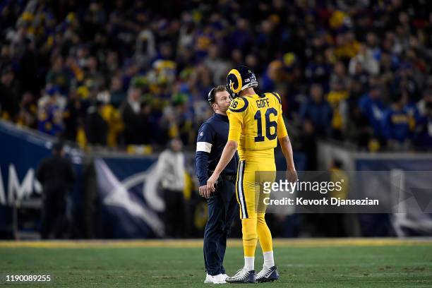 Head coach Sean McVay of the Los Angeles Rams talks to quarterback Jared Goff during the game against the Baltimore Ravens at Los Angeles Memorial...