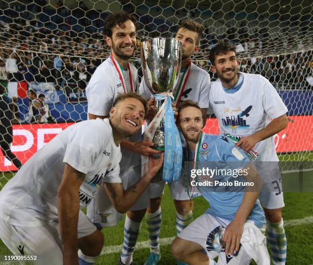 Francesco Acerbi , Ciro Immobile, Marco Parolo, Danilo Cataldi and Manuel Lazzari of SS Lazio celebrate the victory of the Italian Supercup trophy...