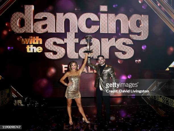 Hannah Brown and Alan Bersten pose at "Dancing with the Stars" Season 28 Finale at CBS Television City on November 25, 2019 in Los Angeles,...