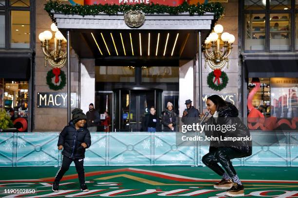 Titan Rowland and Kelly Rowland perform during the 93rd Annual Macy's Thanksgiving Day Parade rehearsals at Macy's Herald Square on November 25, 2019...