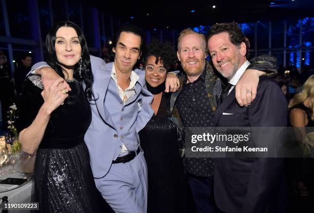 Susie Cave and Nick Cave, both wearing Gucci, Thomas Housego and guests attend the 2019 LACMA Art + Film Gala Presented By Gucci at LACMA on November...