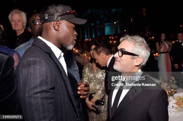 Djimon Hounsou and Alfonso Cuaron, wearing Gucci, attend the 2019 LACMA Art + Film Gala Presented By Gucci at LACMA on November 02, 2019 in Los...